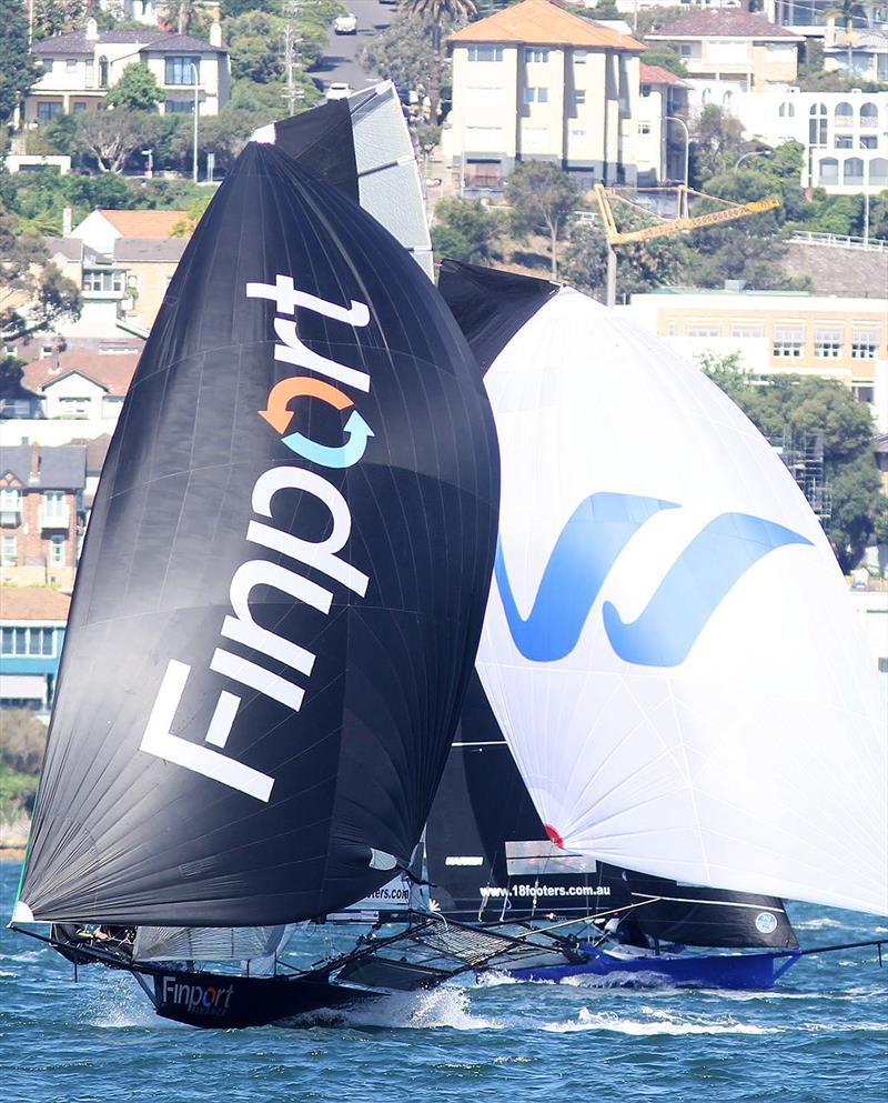 Finport Finance leads Winning Group on the run to the finish in race 1 of the 18ft Skiff Club Championship on Sydney Harbour photo copyright Frank Quealey taken at Australian 18 Footers League and featuring the 18ft Skiff class