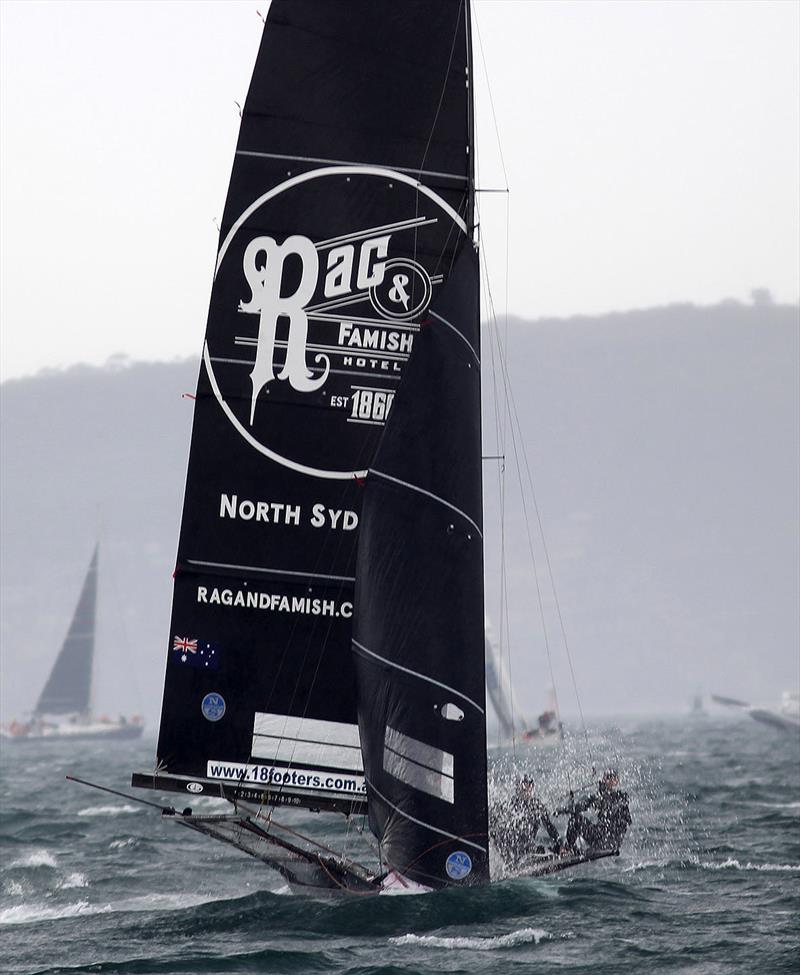 Rag and Famish Hotel on the wild first downwind leg of the course in race 4 of the 18ft Skiff Spring Championship on Sydney Harbour photo copyright Frank Quealey taken at Australian 18 Footers League and featuring the 18ft Skiff class