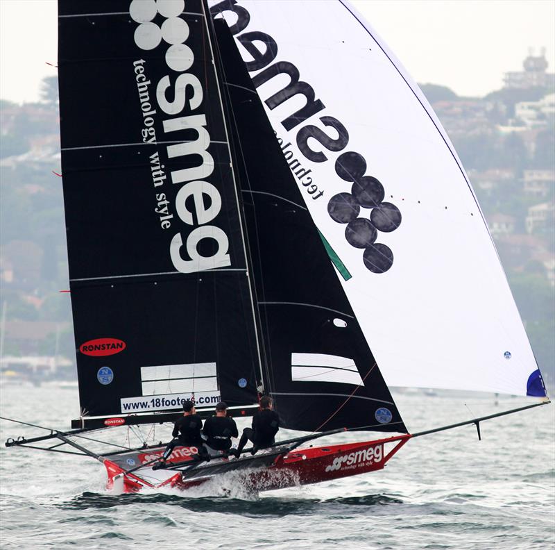 Smeg's spinnaker run down the harbour on lap two was spectacular in race 4 of the 18ft Skiff Spring Championship on Sydney Harbour photo copyright Frank Quealey taken at Australian 18 Footers League and featuring the 18ft Skiff class