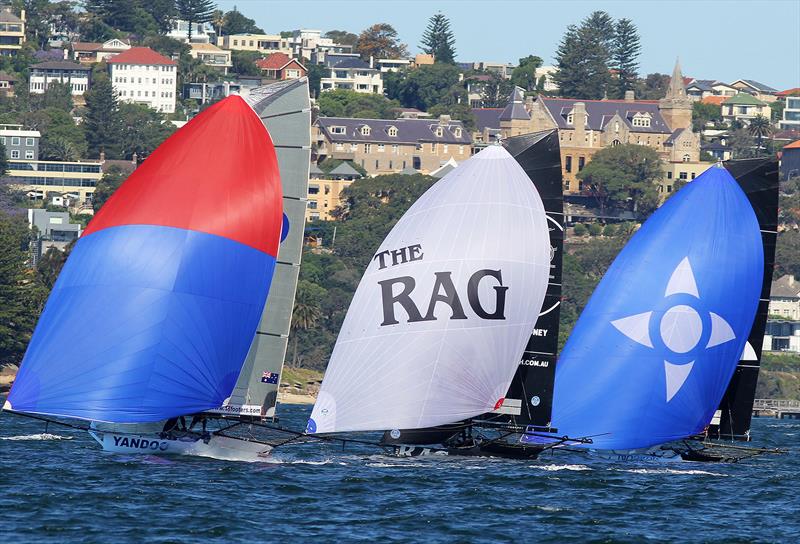 Fleet racing by the group chasing the leader in race 5 of the 18ft Skiff Spring Championship on Sydney Harbour photo copyright Frank Quealey taken at Australian 18 Footers League and featuring the 18ft Skiff class