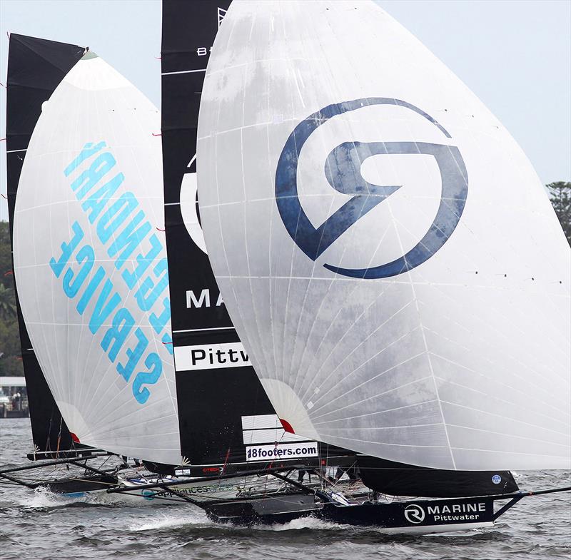 R Marine Pittwater leads Appliancesonline.com.au down the first spinnaker leg of Race 6 on day 4 of the 18ft Skiff Australian Championship photo copyright Frank Quealey taken at Australian 18 Footers League and featuring the 18ft Skiff class