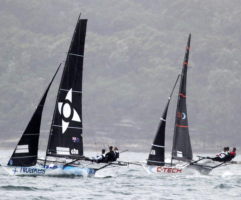Yvette Haritage's Noakes Blue led NZ's C-Tech on the 2-sail reack to the bottom mark off Athol Bay East in race 1 of the 2020 18ft Skiff JJ Giltinan Championship - photo © Frank Quealey