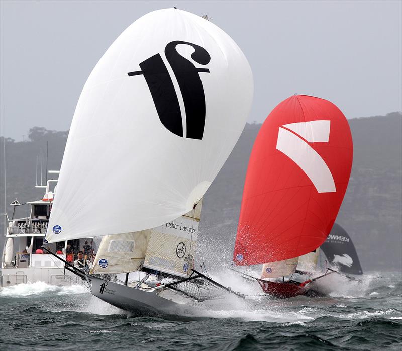 Thurlow Fisher Lawyers leads Gotta Love It 7 down the spinnaker run from the Beashel buoy photo copyright Frank Quealey taken at Australian 18 Footers League and featuring the 18ft Skiff class