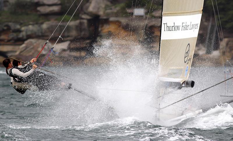 Michael Coxon drives Thurlow Fisher Lawyers into the wind photo copyright Frank Quealey taken at Australian 18 Footers League and featuring the 18ft Skiff class