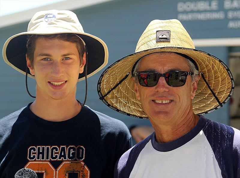 1996 World Champion Stephen Quigley, seen here with his son Tom, is still heavily involved in the sport as an administrator, coach and parent - photo © Frank Quealey