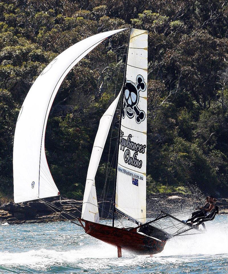 John Winning Jr. drives appliancesonline hard downwind in a North-East wind on Sydney Harbour photo copyright Frank Quealey taken at Australian 18 Footers League and featuring the 18ft Skiff class