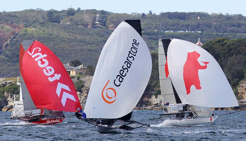 Action down the first spinnakeer run during race 1 of the 18ft Skiff Spring Championship - photo © Frank Quealey