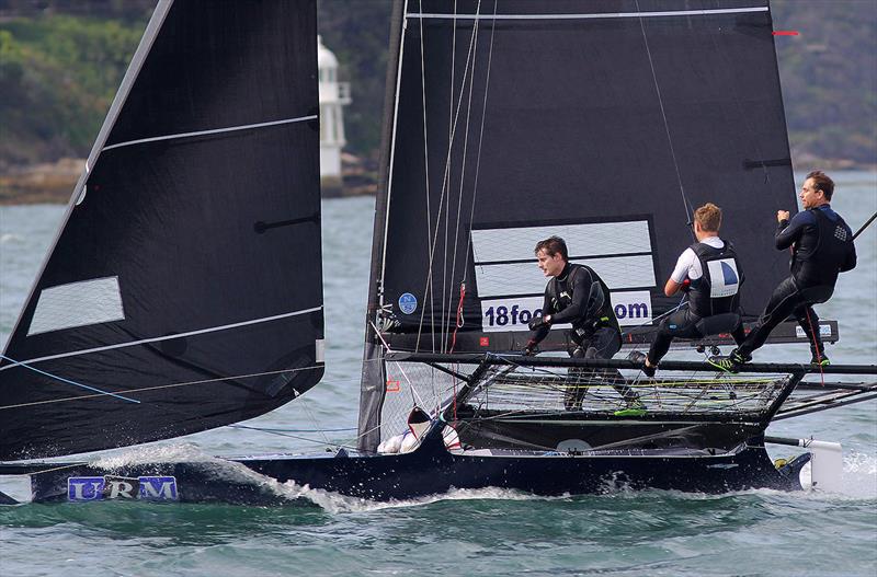 The Andoo team cross the finish line to win race 2 of the 18ft Skiff Spring Championship photo copyright Frank Quealey taken at Australian 18 Footers League and featuring the 18ft Skiff class