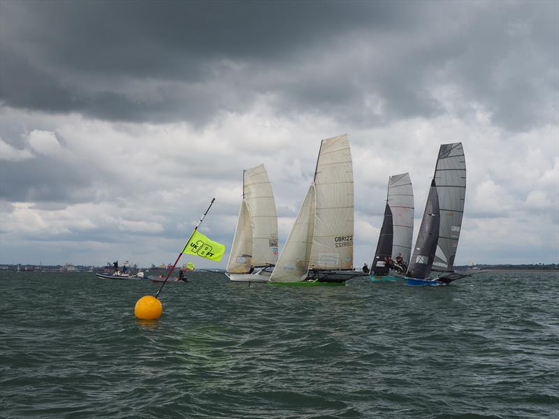 18ft Skiff racing at Calshot photo copyright Kate Sullivan taken at  and featuring the 18ft Skiff class