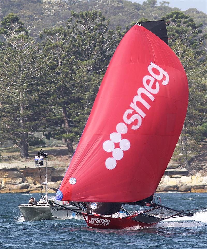 Smeg runs to the finish line with the video team's camera cat catching all the action photo copyright Frank Quealey taken at  and featuring the 18ft Skiff class