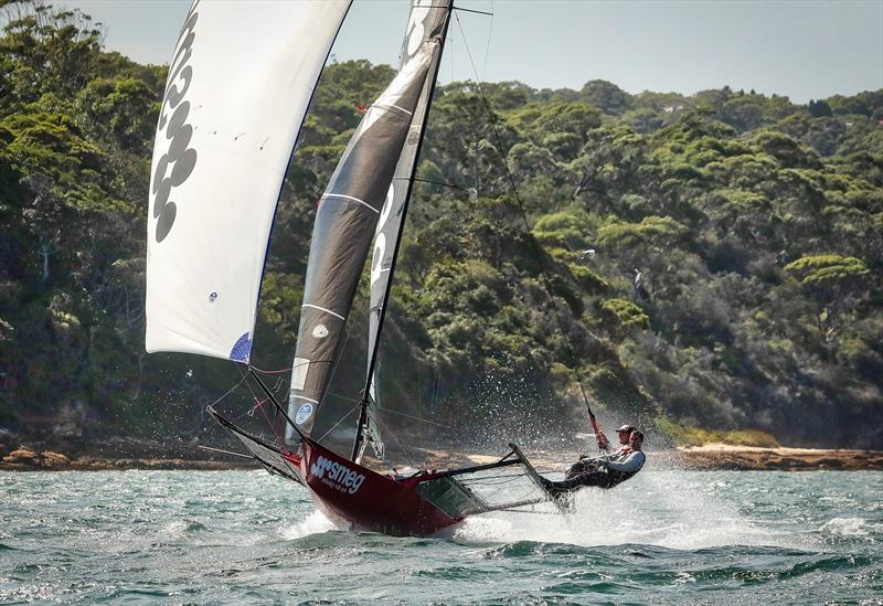 Smeg (Michael Coxon) enjoying a fresh seabreeze - 2019 JJ Giltinan Championship, Sydney harbour, March 2019 photo copyright Michael Chittenden taken at Australian 18 Footers League and featuring the 18ft Skiff class