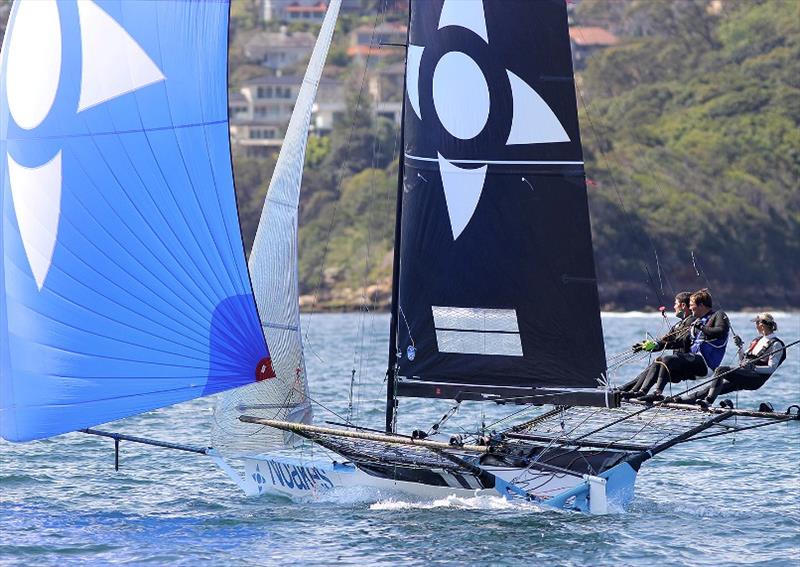 Yvette Heritage send Noakes Blue downwind on the first lap of the course photo copyright Frank Quealey taken at Australian 18 Footers League and featuring the 18ft Skiff class