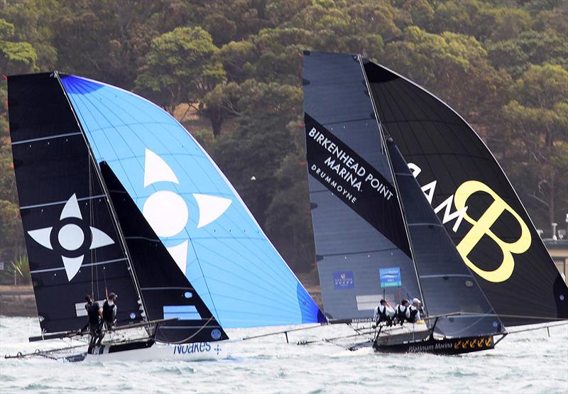 Ton Anderson's Birkenhead Point Marina leads Yvette Hrirage's Noakes Blue on the run to Kurraba Point - 18ft Skiff NSW Championship 2019 photo copyright Frank Quealey taken at Australian 18 Footers League and featuring the 18ft Skiff class