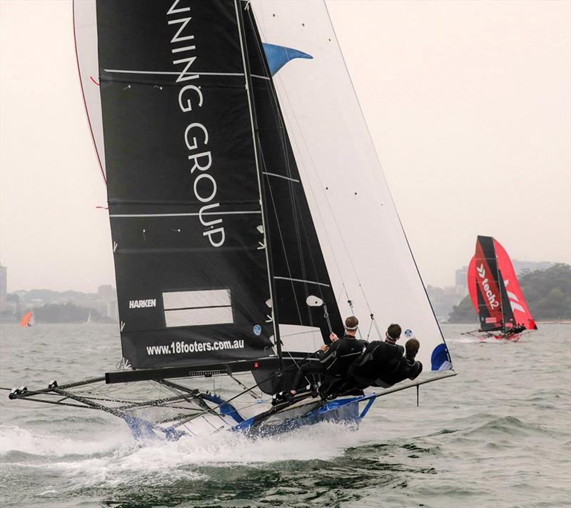 Winning Group chases Tech2 down the spinnaker run to the bottom mark off Clark Island - 18ft Skiff NSW Championship photo copyright Michael Chittenden taken at Australian 18 Footers League and featuring the 18ft Skiff class