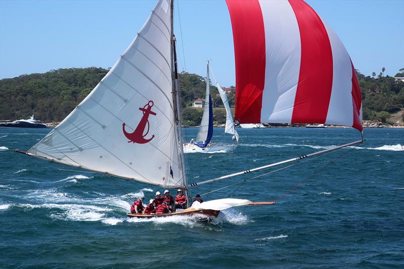 Yendys approach to the wing mark. Great action for those on the spectator ferry, nerve wracking encounter for the crew of Yendys as they negotiate the ferry wash in preparation to gybe at wing mark. Note jib has been lowered in order to swing pole across photo copyright Adrienne Jackson taken at Sydney Flying Squadron and featuring the 18ft Skiff class