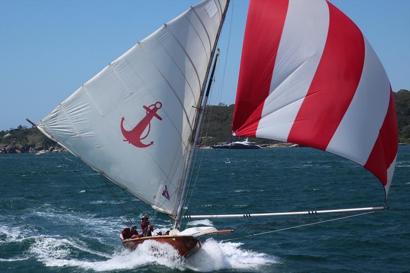 Yendys approach to the wing mark. Great action for those on the spectator ferry, nerve wracking encounter for the crew of Yendys as they negotiate the ferry wash in preparation to gybe at wing mark. Note jib has been lowered in order to swing pole across photo copyright Adrienne Jackson taken at Sydney Flying Squadron and featuring the 18ft Skiff class