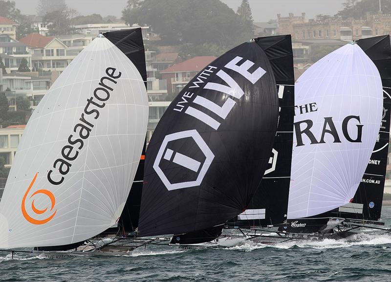 Close fleet racing during the 2019- Season - JJ Giltinan Championship photo copyright Frank Quealey taken at Australian 18 Footers League and featuring the 18ft Skiff class