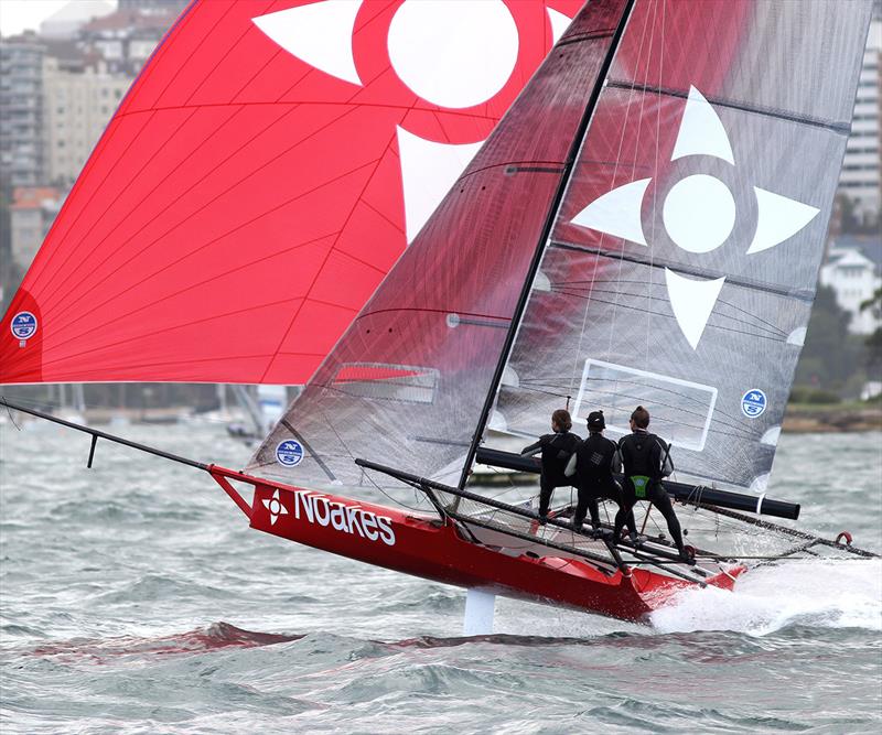 Sean Langman drives Noakesailing downwind in a Nor-Easter on Sydney Harbour photo copyright Frank Quealey taken at Australian 18 Footers League and featuring the 18ft Skiff class