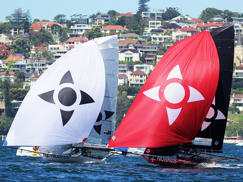 Noakes Youth (white spinnaker) and Noakesailing (red) go head-to-head during the 2017-2018 Season photo copyright Frank Quealey taken at Australian 18 Footers League and featuring the 18ft Skiff class