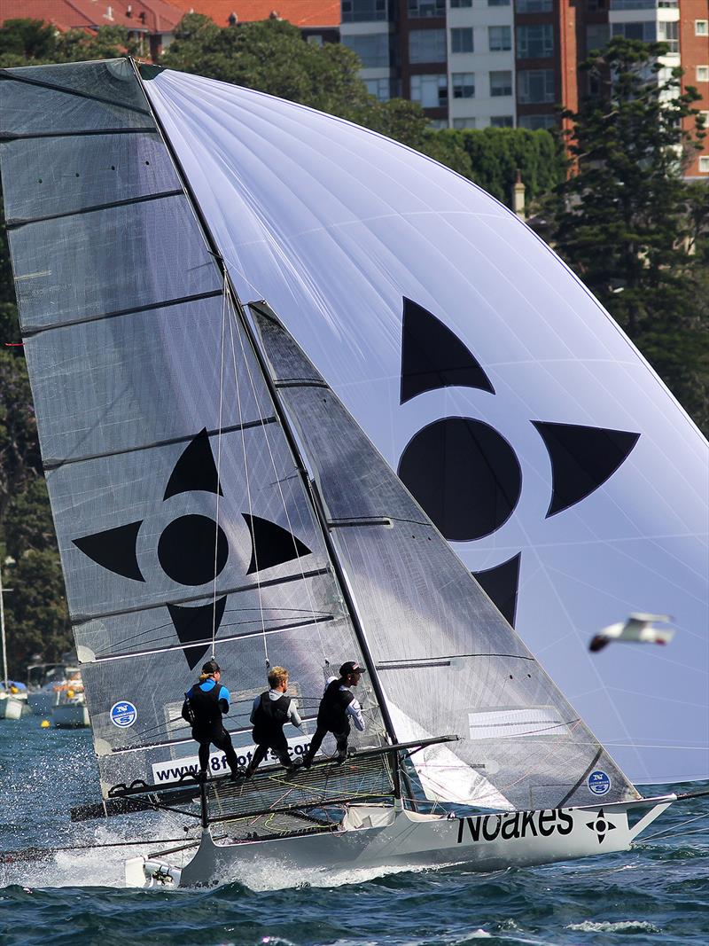 The Kirk Mitchell led Noakes Youth on a spinnaker run between Shark and Clark Islands photo copyright Frank Quealey taken at Australian 18 Footers League and featuring the 18ft Skiff class