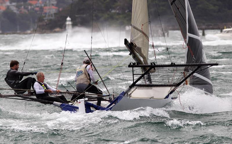 Hard work shows on the face of the Yandoo skipper - 18ft Skiff NSW Championship Race 2 photo copyright Frank Quealey taken at Australian 18 Footers League and featuring the 18ft Skiff class