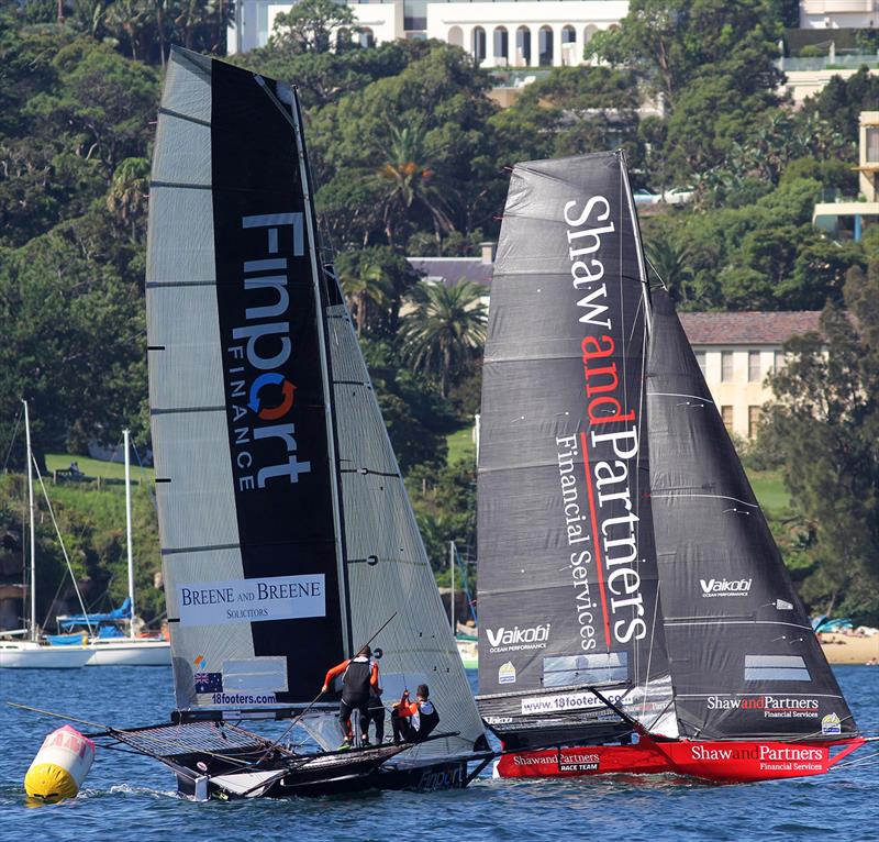 A critical moment for the two leaders at the windward mark in Rose Bay late in race 15 of the 18ft Skiff Club Championship photo copyright Frank Quealey taken at Australian 18 Footers League and featuring the 18ft Skiff class