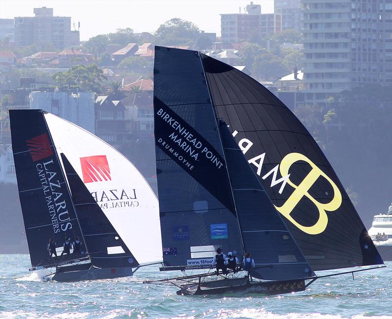 Birkenhead Point Marina and Lazarus Capital Partners battle for seventh position on the run to Chowder Bay during race 15 of the 18ft Skiff Club Championship photo copyright Frank Quealey taken at Australian 18 Footers League and featuring the 18ft Skiff class