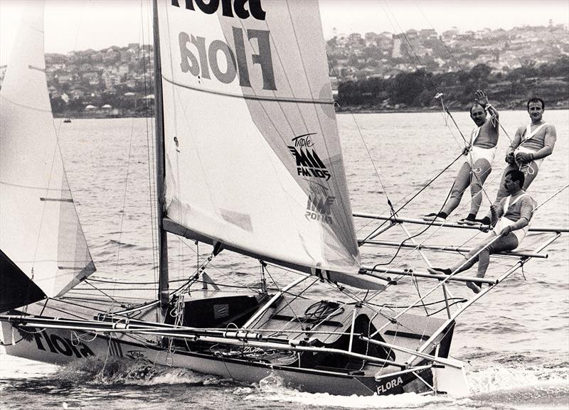 John, Jay Harrison and Grant Pollitt on Flora-MMM in the 1980s - photo © 18ft skiff Archive