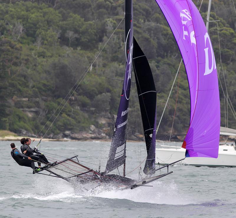 18ft Skiff NSW Championship Race 2: The Rag and Famish Hotel crew battle the spinnaker on the run from Rose Bay photo copyright Frank Quealey taken at Australian 18 Footers League and featuring the 18ft Skiff class