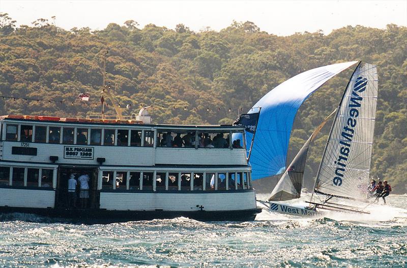 Racing close to the spectator ferry in the early 2000s photo copyright Frank Quealey taken at Australian 18 Footers League and featuring the 18ft Skiff class
