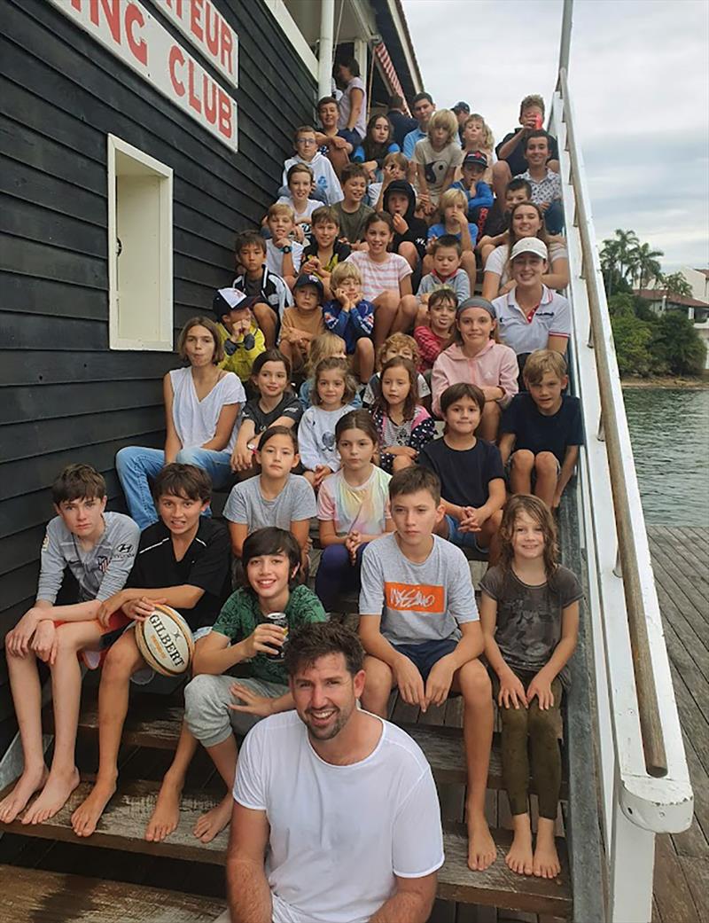 9-times JJ Giltinan 18 ft skiff champion Seve Jarvin with the Vaucluse Amateur 12 Foot Sailing Club juniors photo copyright Frank Quealey taken at Vaucluse Amateur 12ft Sailing Club and featuring the 18ft Skiff class