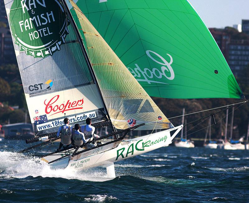 The Harris brothers in action on Rag and Famish Hotel on Sydney Harbour photo copyright Frank Quealey taken at Vaucluse Amateur 12ft Sailing Club and featuring the 18ft Skiff class