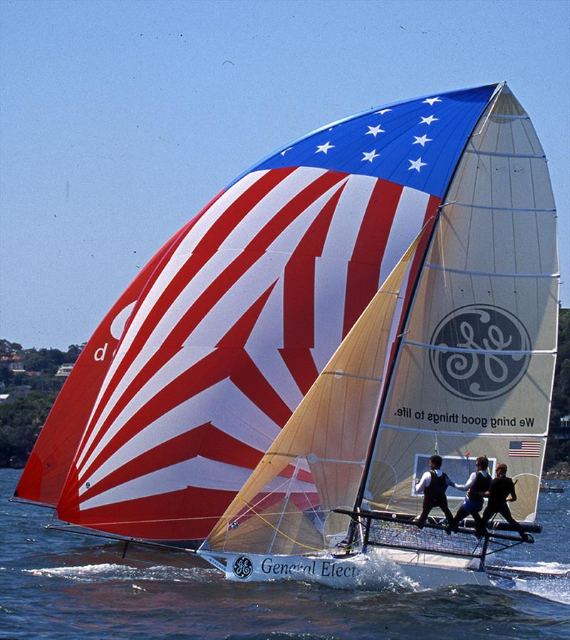 GE-US Challenge and Derwent Racing (mainly obscured) in a close spinnaker battle during the 2002 regatta  - JJ Giltinan World Championship photo copyright Bob Ross taken at Australian 18 Footers League and featuring the 18ft Skiff class