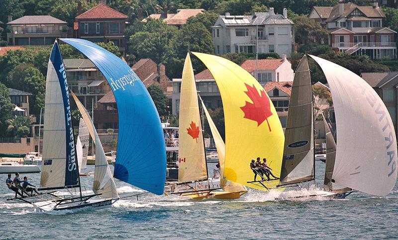 Bell Partners leads Canada and Sunday Telegraph during the 2002 JJ Giltinan World Championship photo copyright Frank Quealey taken at Australian 18 Footers League and featuring the 18ft Skiff class