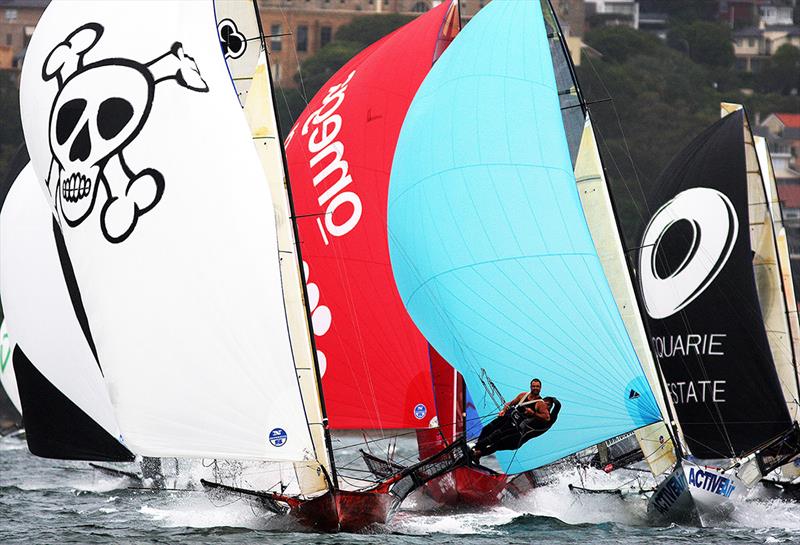 Appliances Online leads the spinnaker charge at the 2009 JJ Giltinan Championship photo copyright Frank Quealey taken at Australian 18 Footers League and featuring the 18ft Skiff class