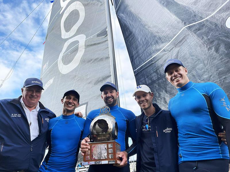 2022 JJ Giltinan champion crew, Seve Jarvin, Sam Newton and Matt Stenta with Iain Murray and sponsor, John Winning Jr photo copyright Jessica Crisp taken at Australian 18 Footers League and featuring the 18ft Skiff class