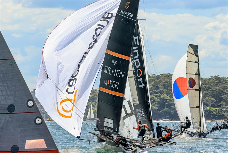 The Kitchen Maker was in fourth place as her crew set the spinnaker for the first run in Race 1 - NSW 18ft Skiff Championship photo copyright SailMedia taken at Australian 18 Footers League and featuring the 18ft Skiff class