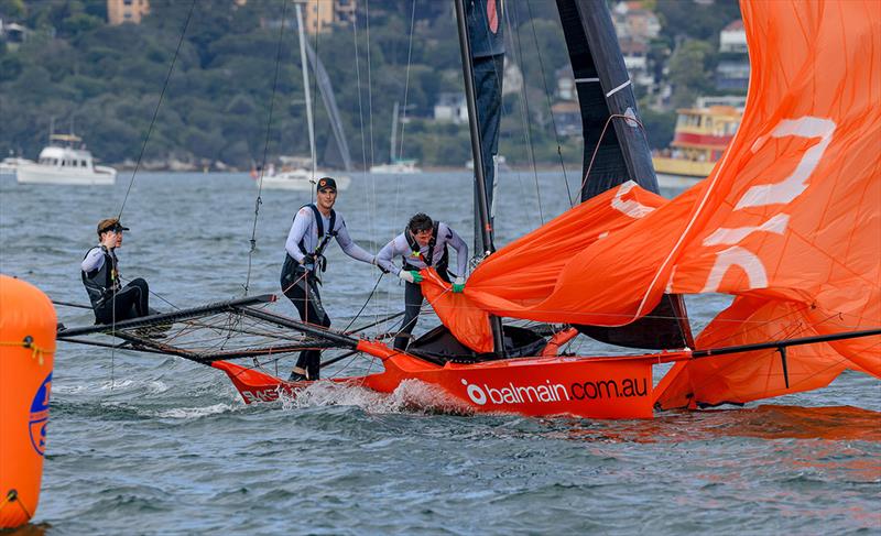Balmain's crew drop the spinnaker at the bottom mark rounding - NSW 18ft Skiff Championship photo copyright SailMedia taken at Australian 18 Footers League and featuring the 18ft Skiff class