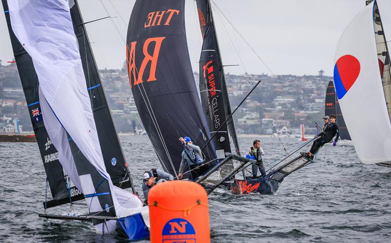18ft Skiff 2024 JJ Giltinan Championship Race 1: Tight rounding photo copyright SailMedia taken at Australian 18 Footers League and featuring the 18ft Skiff class