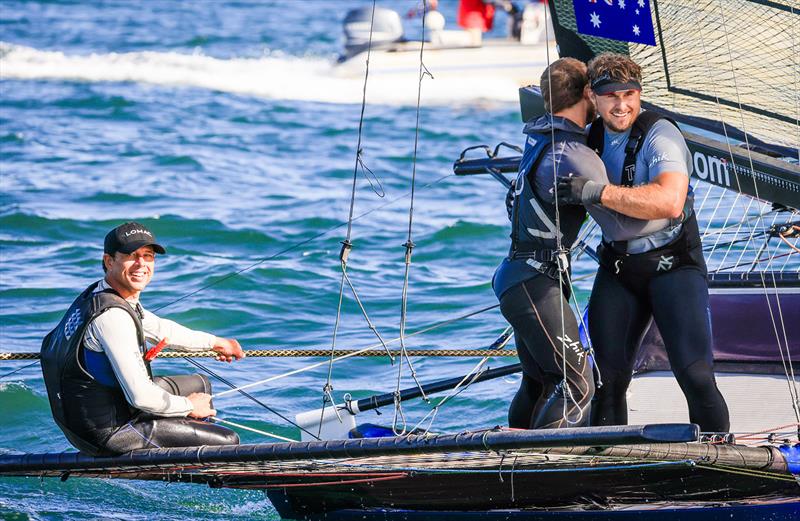 A happy winning Yandoo team of Micah Lane, Fang Warren and Lewis Brake win the 18ft Skiff Winnings 2024 JJ Giltinan Championship photo copyright SailMedia taken at Australian 18 Footers League and featuring the 18ft Skiff class