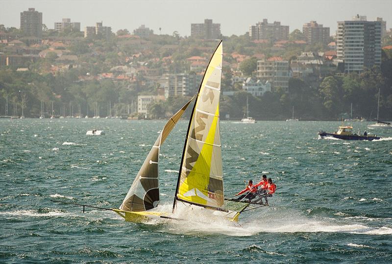 RMW Marine's crew drive the skiff hard as they chase the winner to the finish line - JJ Giltinan World 18 Footer Championship photo copyright Frank Quealey taken at Australian 18 Footers League and featuring the 18ft Skiff class