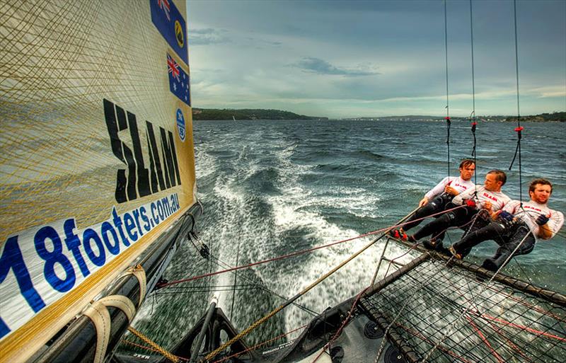 Onboard the 18 feet skiff Slam sailed by Grant Rollerson along with experienced crew members Anthony (Jack) Young and Peter Nicholson in Sydney Harbour. The 18ft Skiff is considered the fastest class of sailing skiffs - photo © Christophe Launay