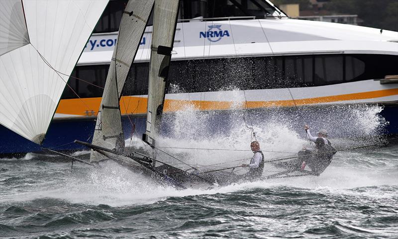 Heading towards a Sydney Harbour ferry in the 2021-22 season photo copyright Frank Quealey taken at Australian 18 Footers League and featuring the 18ft Skiff class