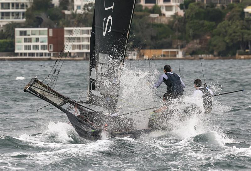 Crew battles the 30knot westerly winds that swept across Sydney Harbour during the opening race of the season two weeks ago photo copyright SailMedia taken at Australian 18 Footers League and featuring the 18ft Skiff class