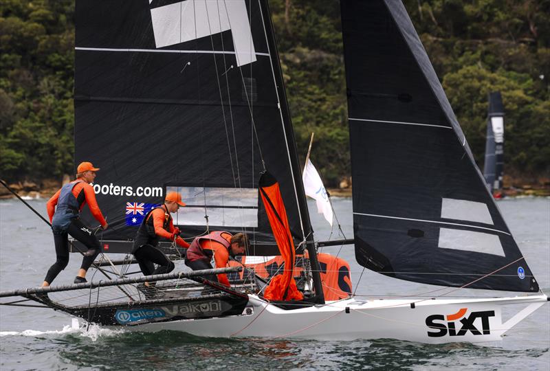 Sixt crew going for the spinnaker for the run home in Race 3 photo copyright SailMedia taken at Australian 18 Footers League and featuring the 18ft Skiff class