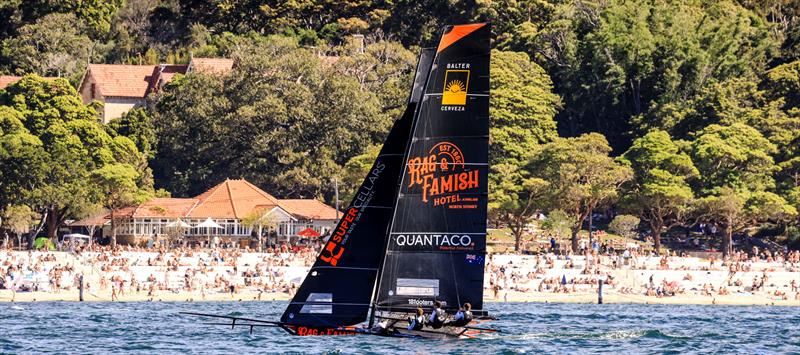 Beachgoers get a good look at The Rag in a north east wind photo copyright SailMedia taken at Australian 18 Footers League and featuring the 18ft Skiff class