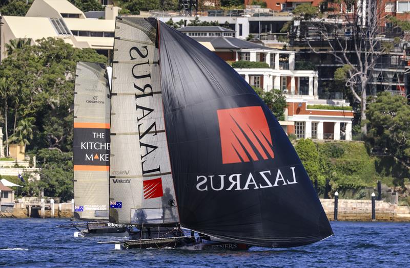 JJ Giltinan 18ft Skiff World Championship 2026 Race 8 - Lazarus leads under spinnaker photo copyright SailMedia taken at Australian 18 Footers League and featuring the 18ft Skiff class