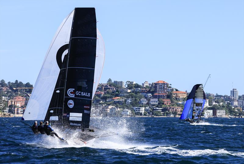 JJ Giltinan 18ft Skiff World Championship 2026 Race 9 - GC Sails chases Black Knight down the second spinnaker run photo copyright SailMedia taken at Australian 18 Footers League and featuring the 18ft Skiff class