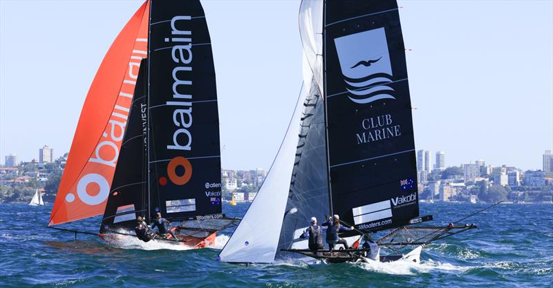 JJ Giltinan 18ft Skiff World Championship 2026 Race 9 - Balmain and Club Marine crews work hard on the spinnaker run photo copyright SailMedia taken at Australian 18 Footers League and featuring the 18ft Skiff class