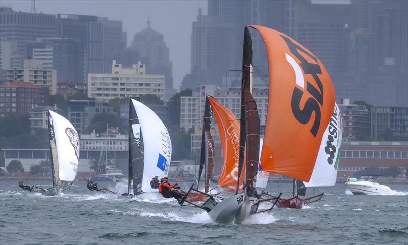 Sixt 18ft skiff racing team racing downwind in a southerly at the Giltinan Championship photo copyright SailMedia taken at Australian 18 Footers League and featuring the 18ft Skiff class